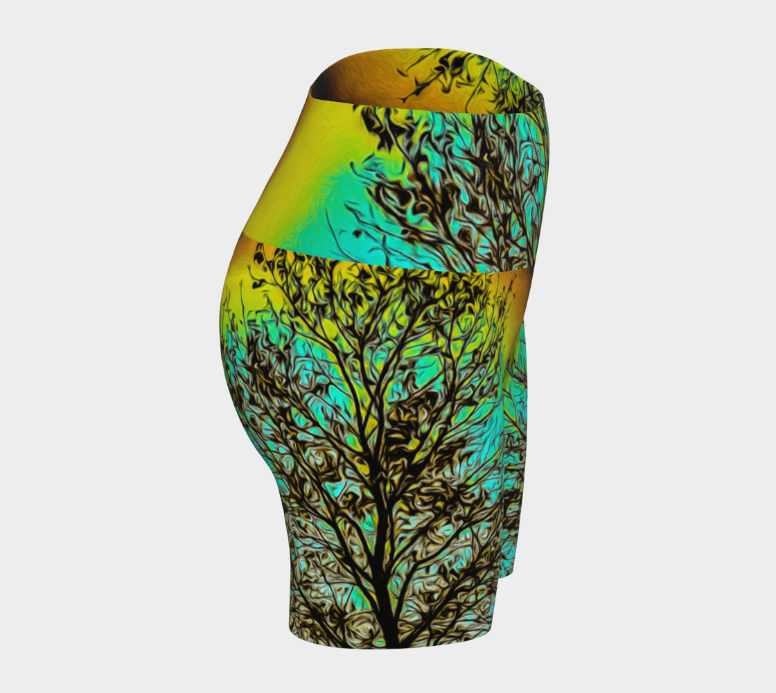 Island Tree of Life yoga shorts features an all over print.  the image is of a tree with a turquoise background.