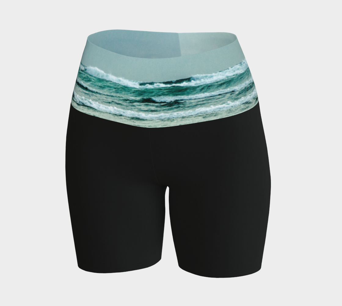 Ocean Calling Long Beach Tofino Yoga shorts.  The image of the ocean waves is printed on the waistband. The rest of the shorts is black.