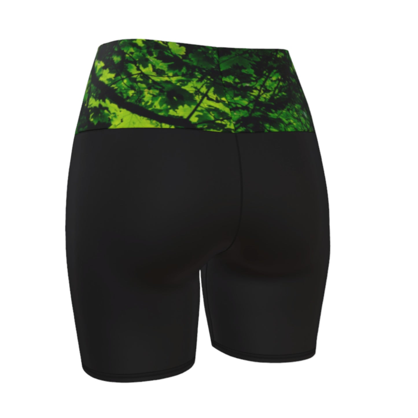 Back View Canopy of Leaves yoga shorts.  The high waist band features a canopy of leaves printed on it.  the bottom portion of the shorts are black.