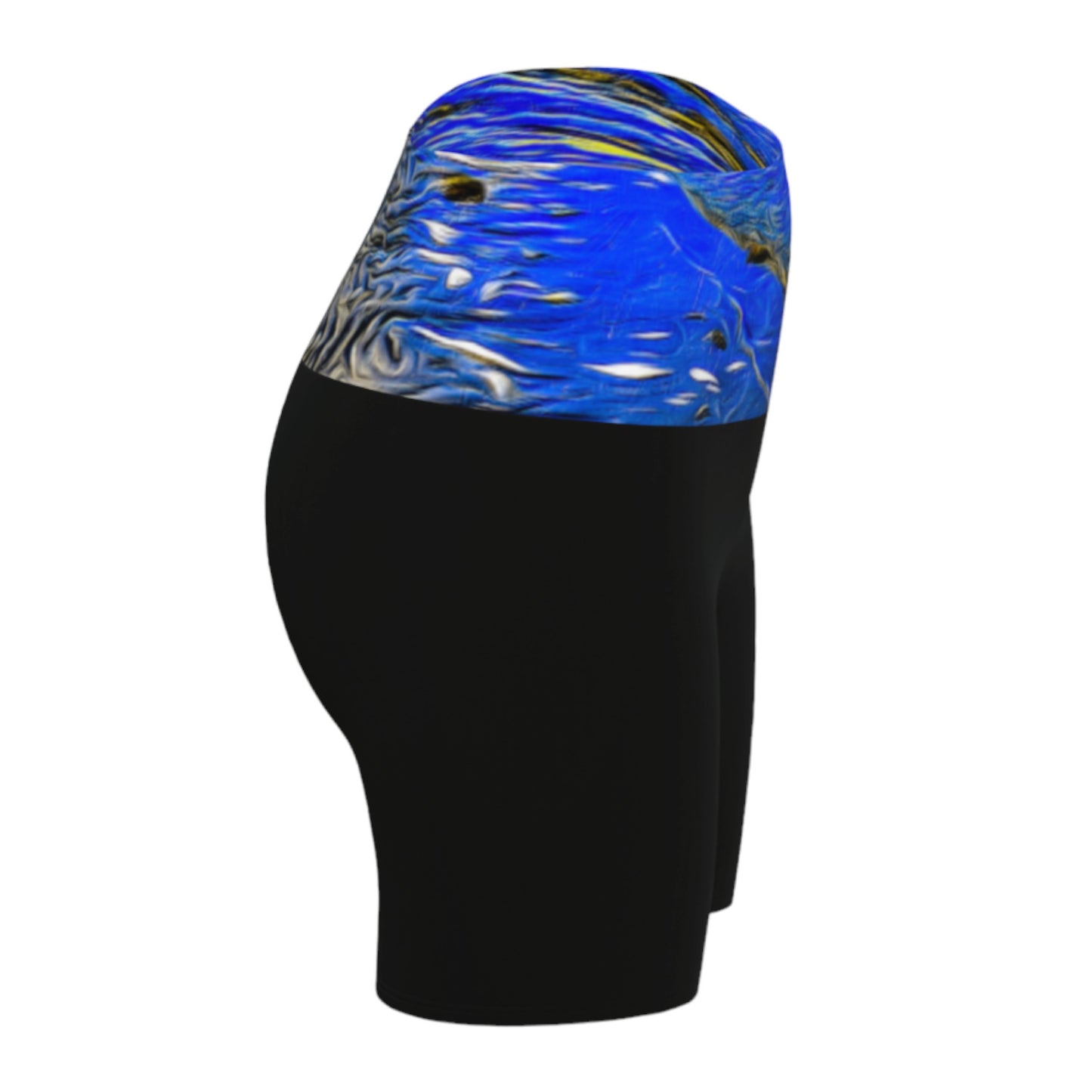 Right view Ebb and Flow Yoga shorts feature a image of the ocean water at low tide with the sky and the sun reflecting on the water. This image is printed on the band of the yoga shorts.  The bottom of the shorts are black.