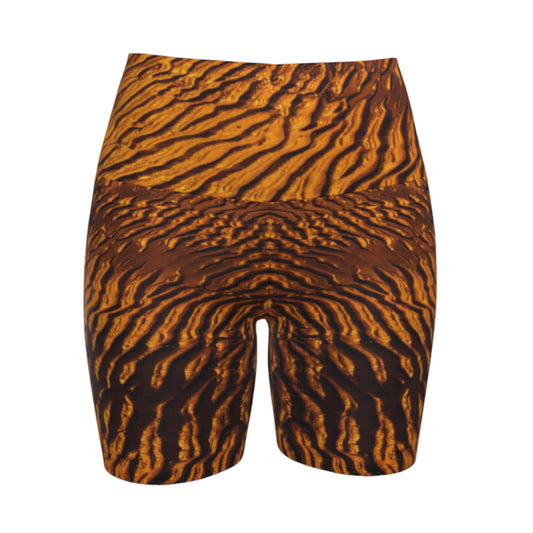 Golden Sand yoga shorts feature a image of the sand at low tide as the sun is setting it casts a golden hue across the beach. This image is printed all over the shorts.