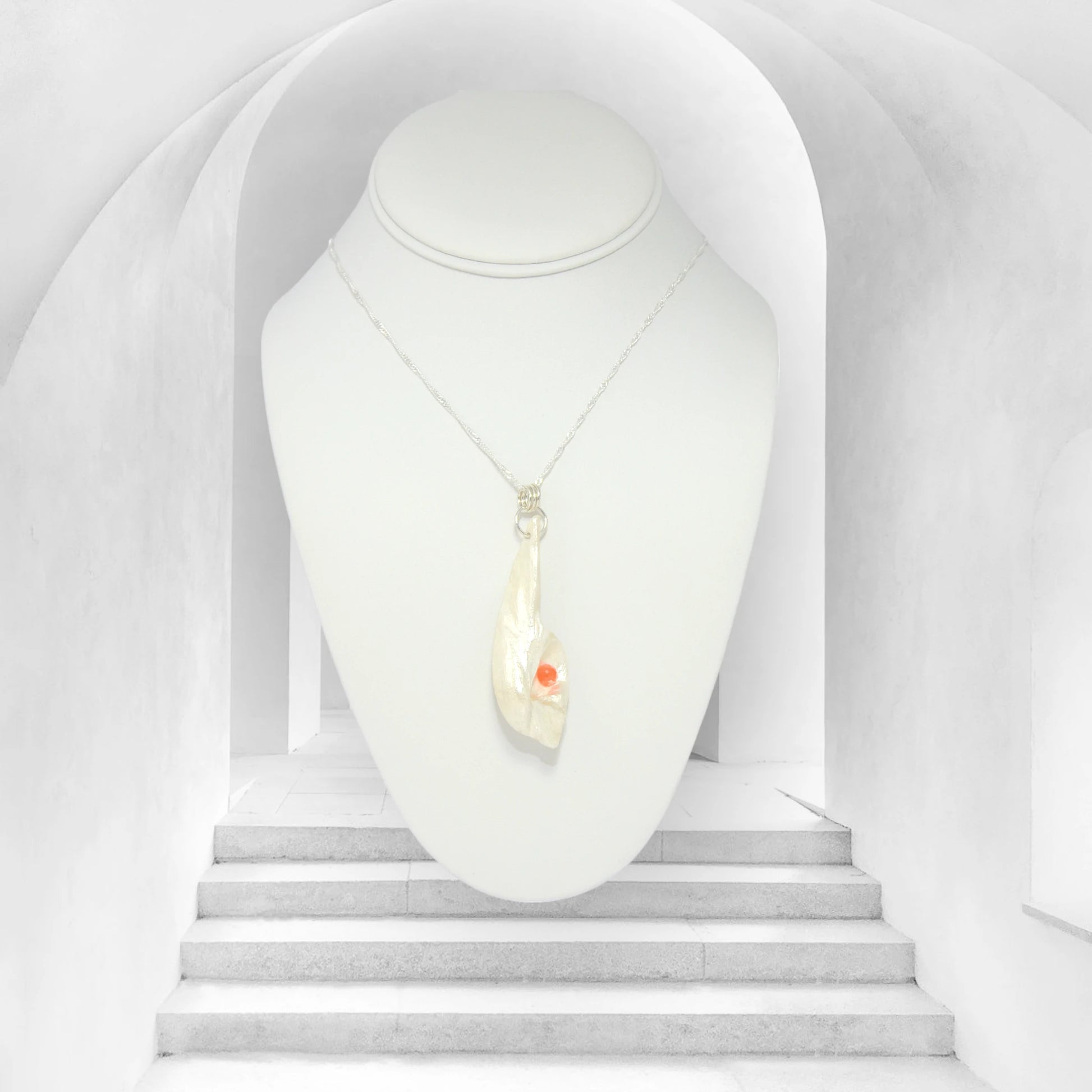 Tequila Sunrise natural seashell pendant a rose cut Carnelian gemstone.