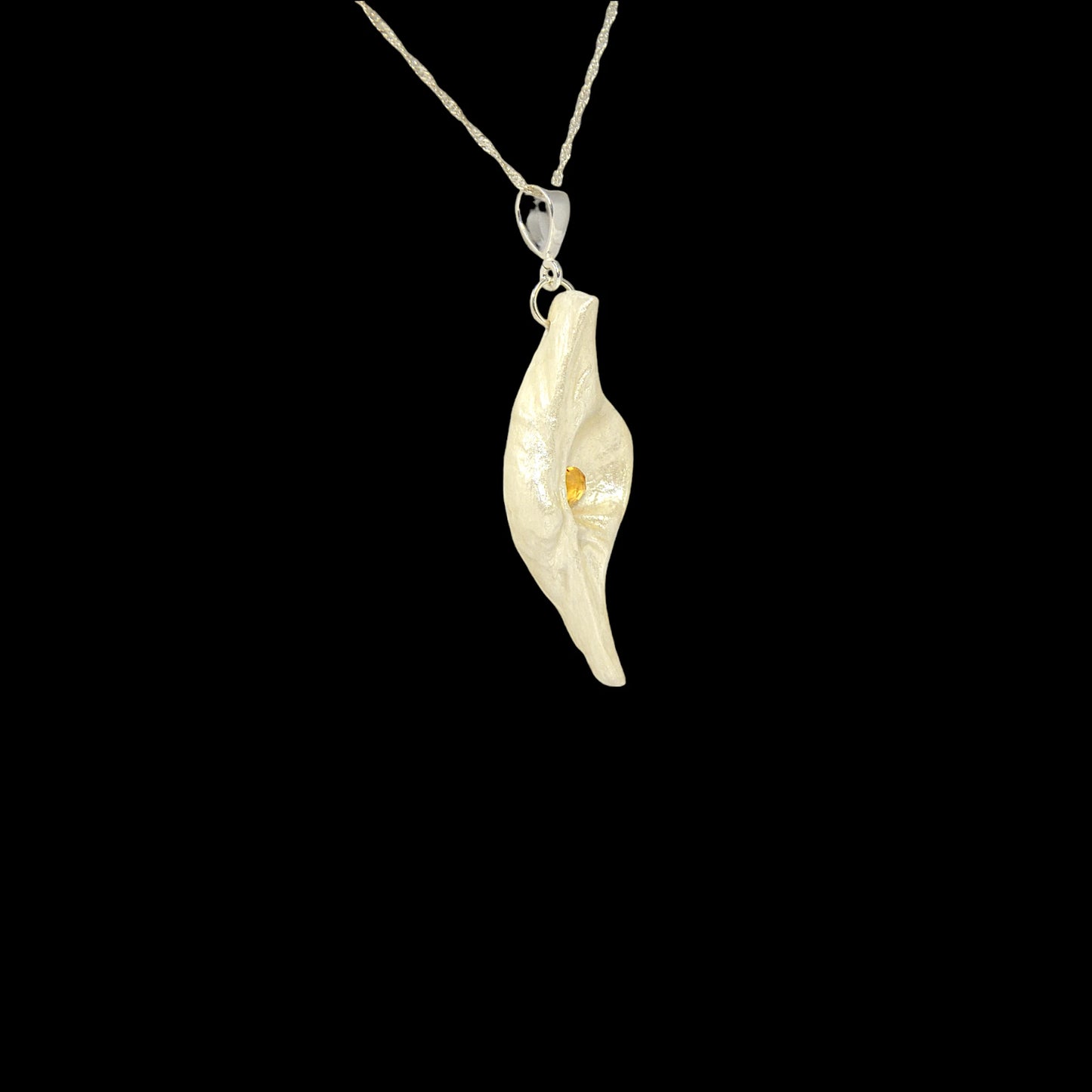 Lightmaker natural seashell pendant A beautiful pear shaped rose cut Citrine compliments the pendant.
