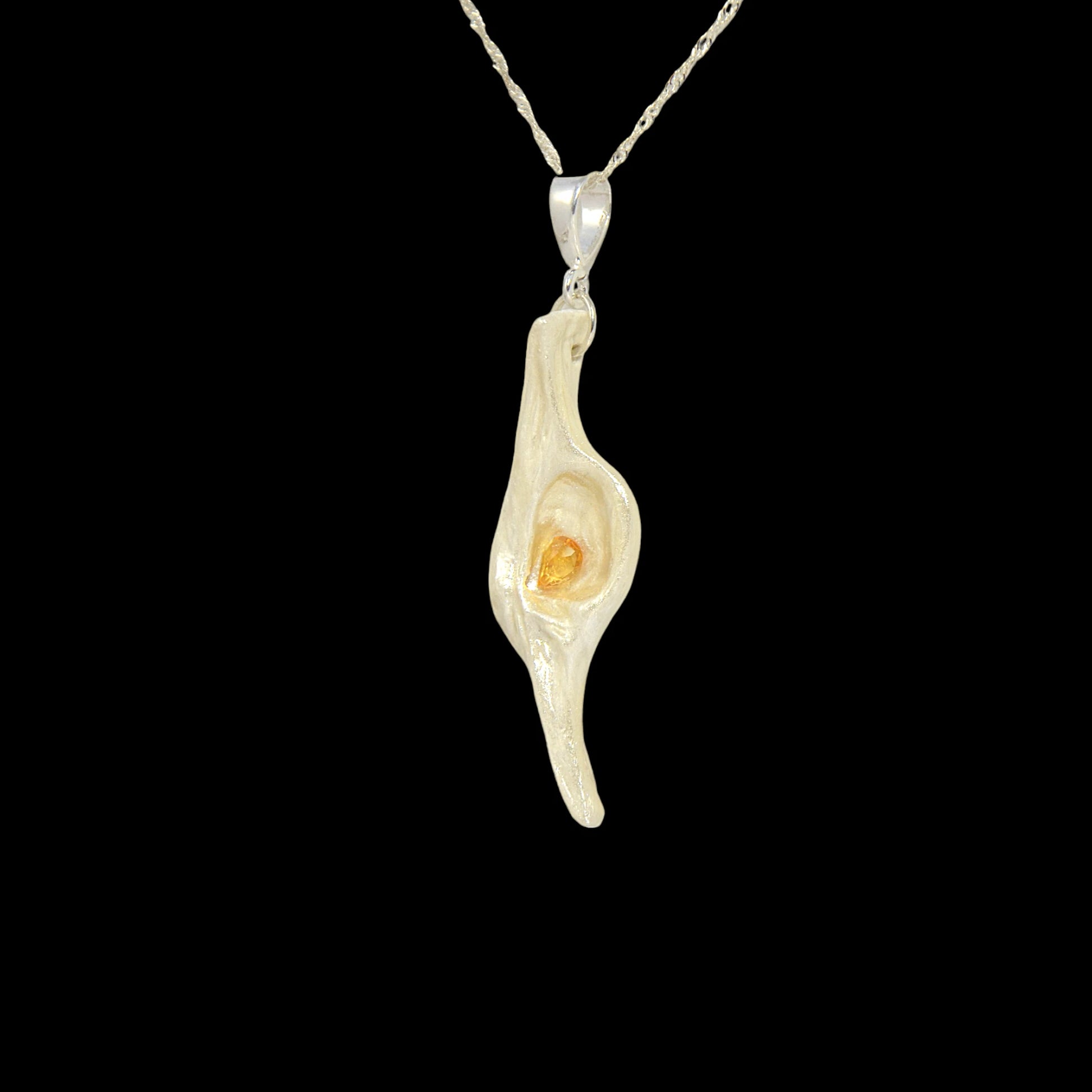 Lightmaker natural seashell pendant A beautiful pear shaped rose cut Citrine compliments the pendant.
