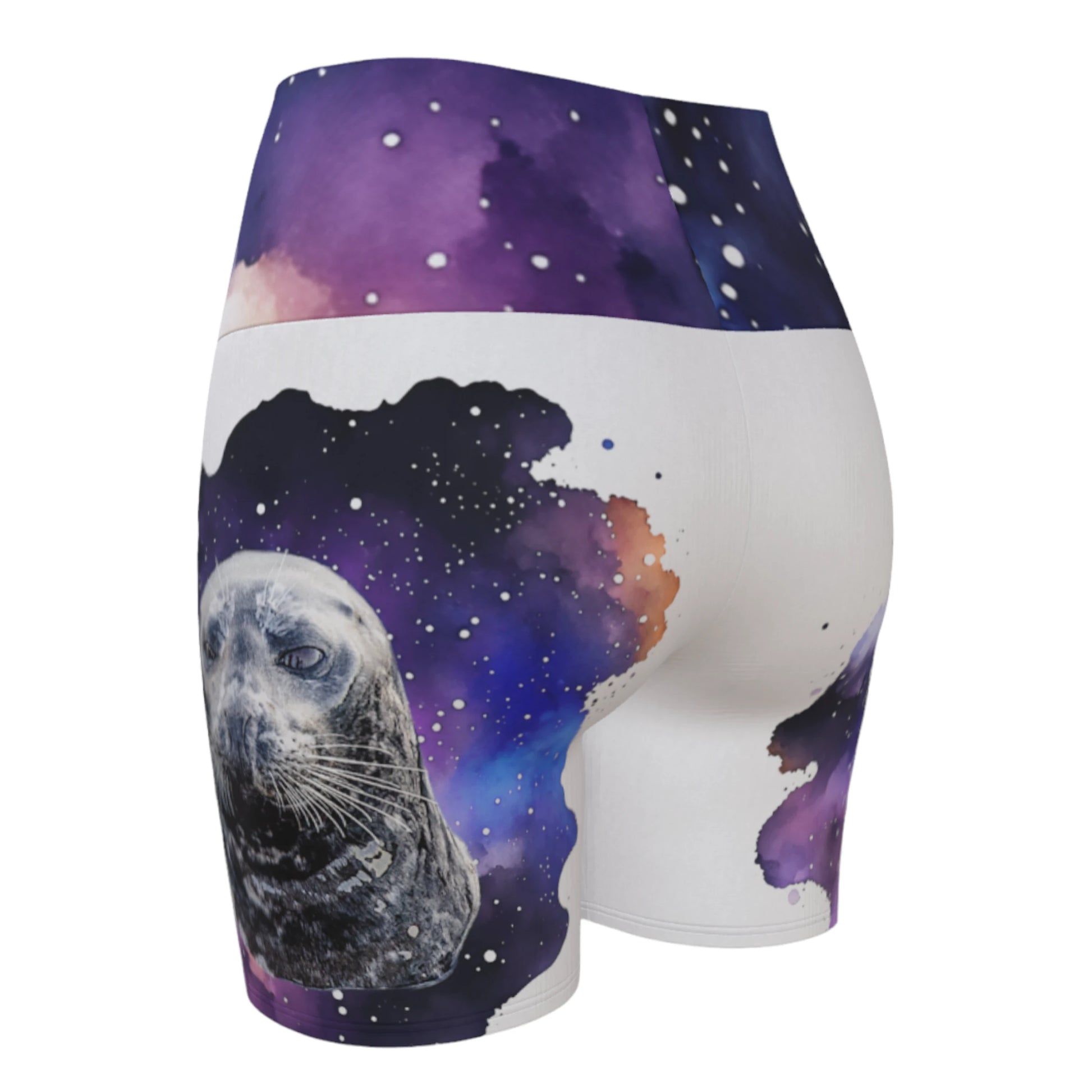 I Love Lucy Yoga shorts. All over print with a colourful celestial  abstract and a image of a harbour seal named Lucy.  The shorts are white with the image printed on it plus the band.