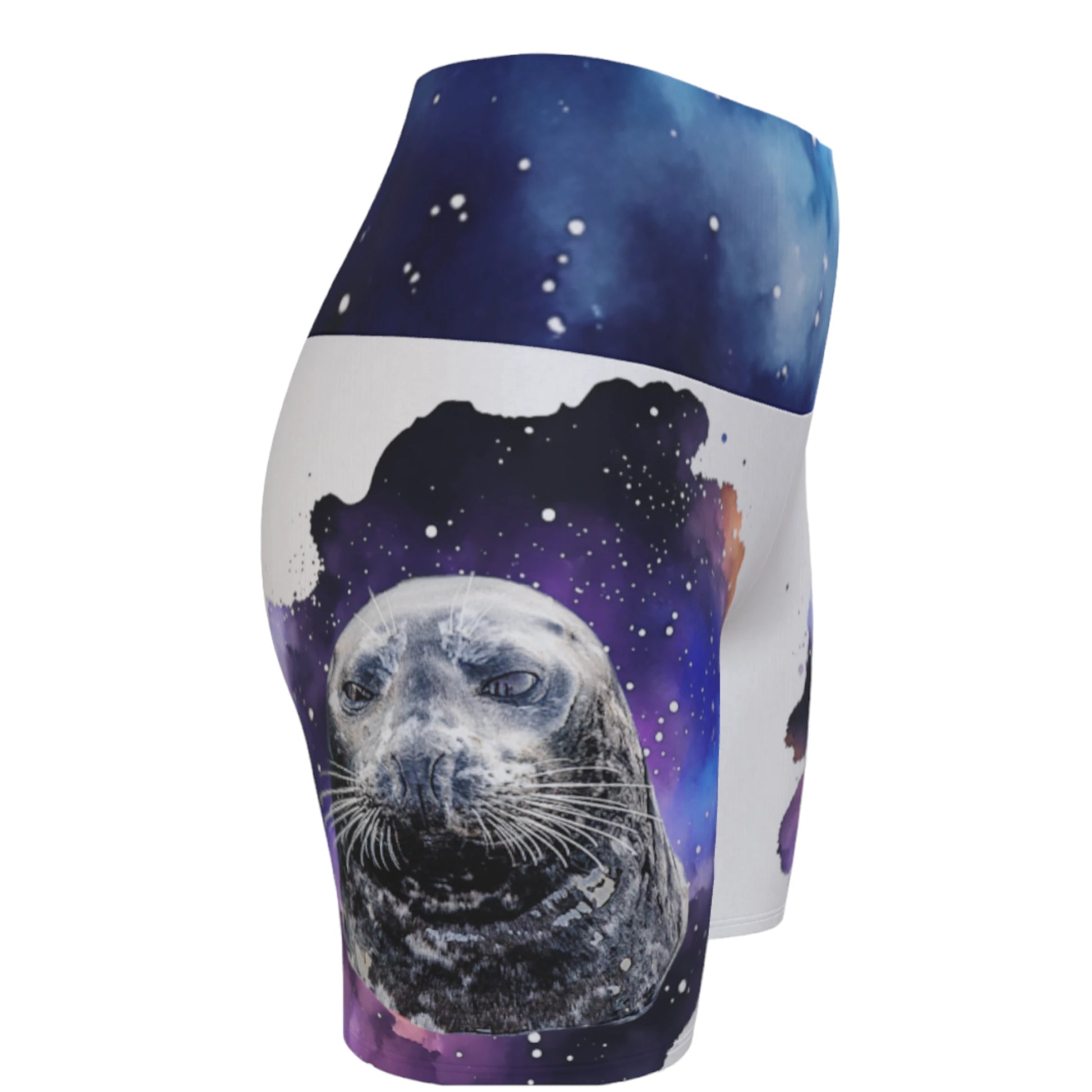 I Love Lucy Yoga shorts. All over print with a colourful celestial  abstract and a image of a harbour seal named Lucy.  The shorts are white with the image printed on it plus the band.