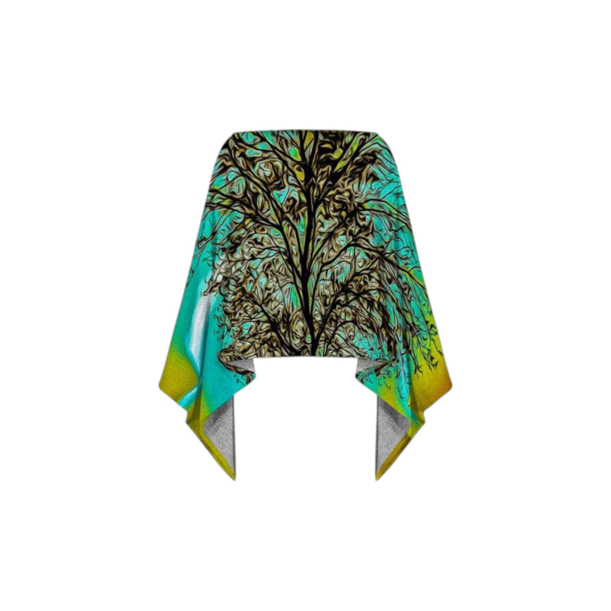 all over print poncho with an image of a tree with the sun setting behind it