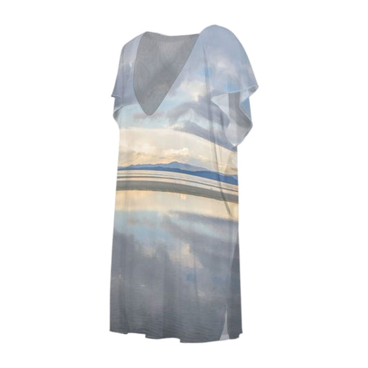 All over print beach dress with a image of early morning light at the beach with sky reflecting in the ocean water.