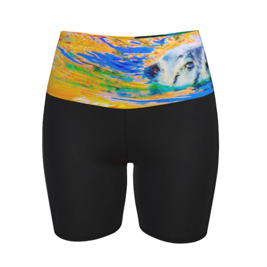 Otter Art Yoga Shorts feature a image of a sea otter printed on the waistband. The rest of the shorts are black.