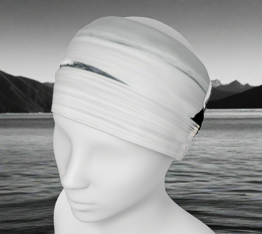 Orca spy hop headband and or neck gaiter features two orcas one in the spy hop position .